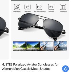 Brand new still in original  package 2 pair of Polaroid sunglasses his/hers